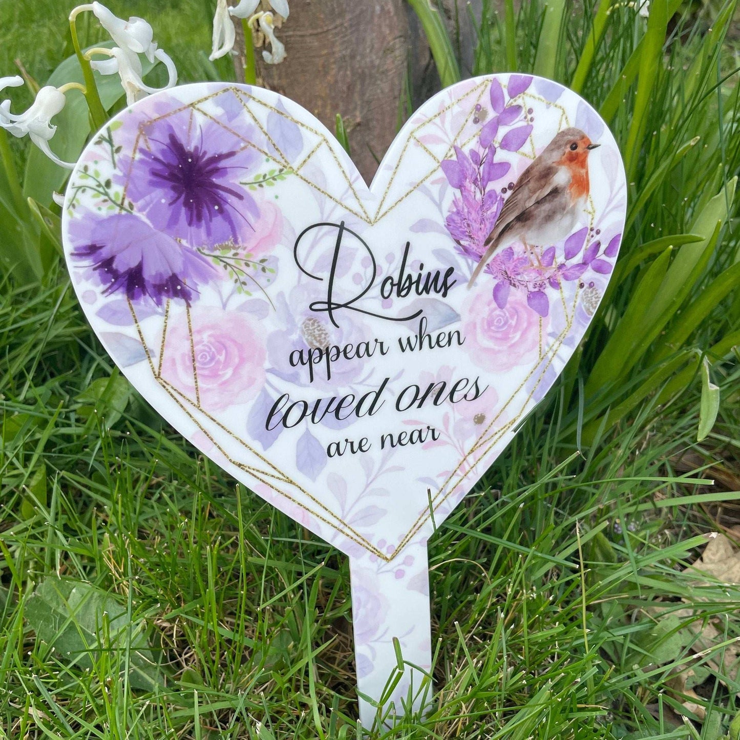 Robins Appear When Loved Ones Are Near Grave Marker
