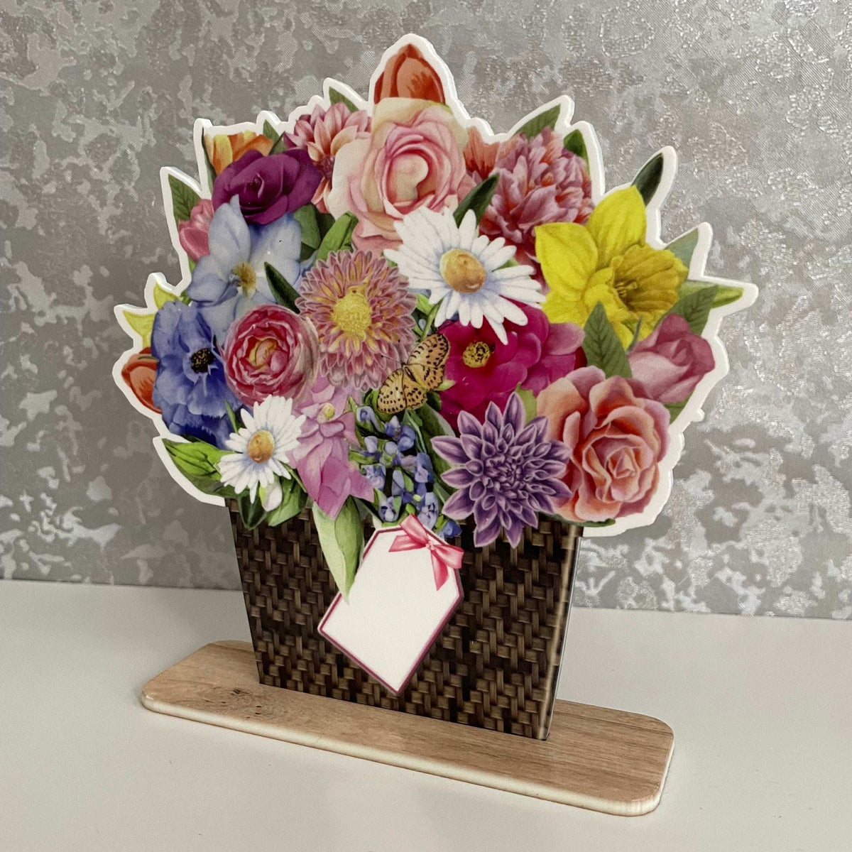 Personalised flower bouquet keepsake plaque displayed on a windowsill