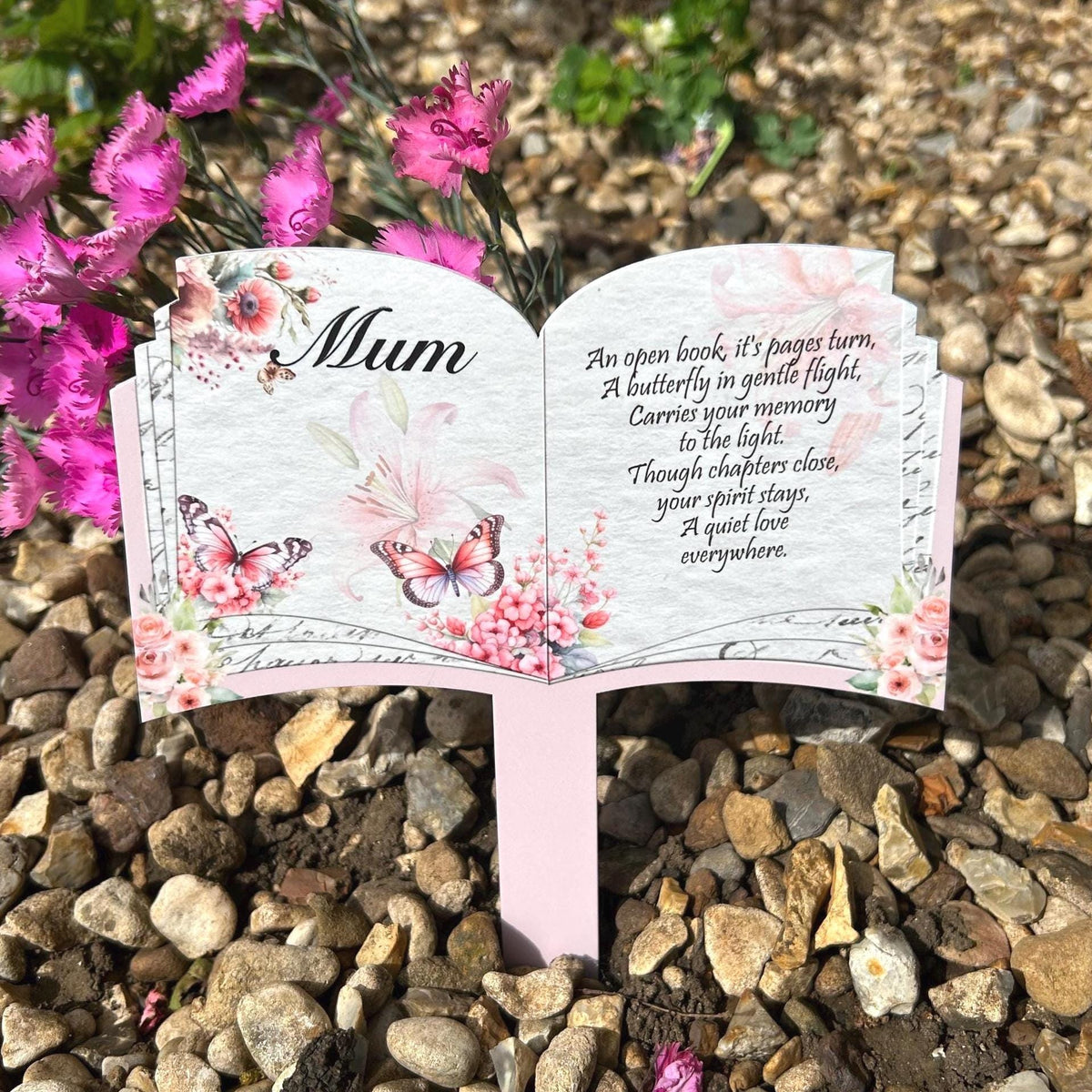 Pink floral butterfly open book grave marker with personalised name and dates