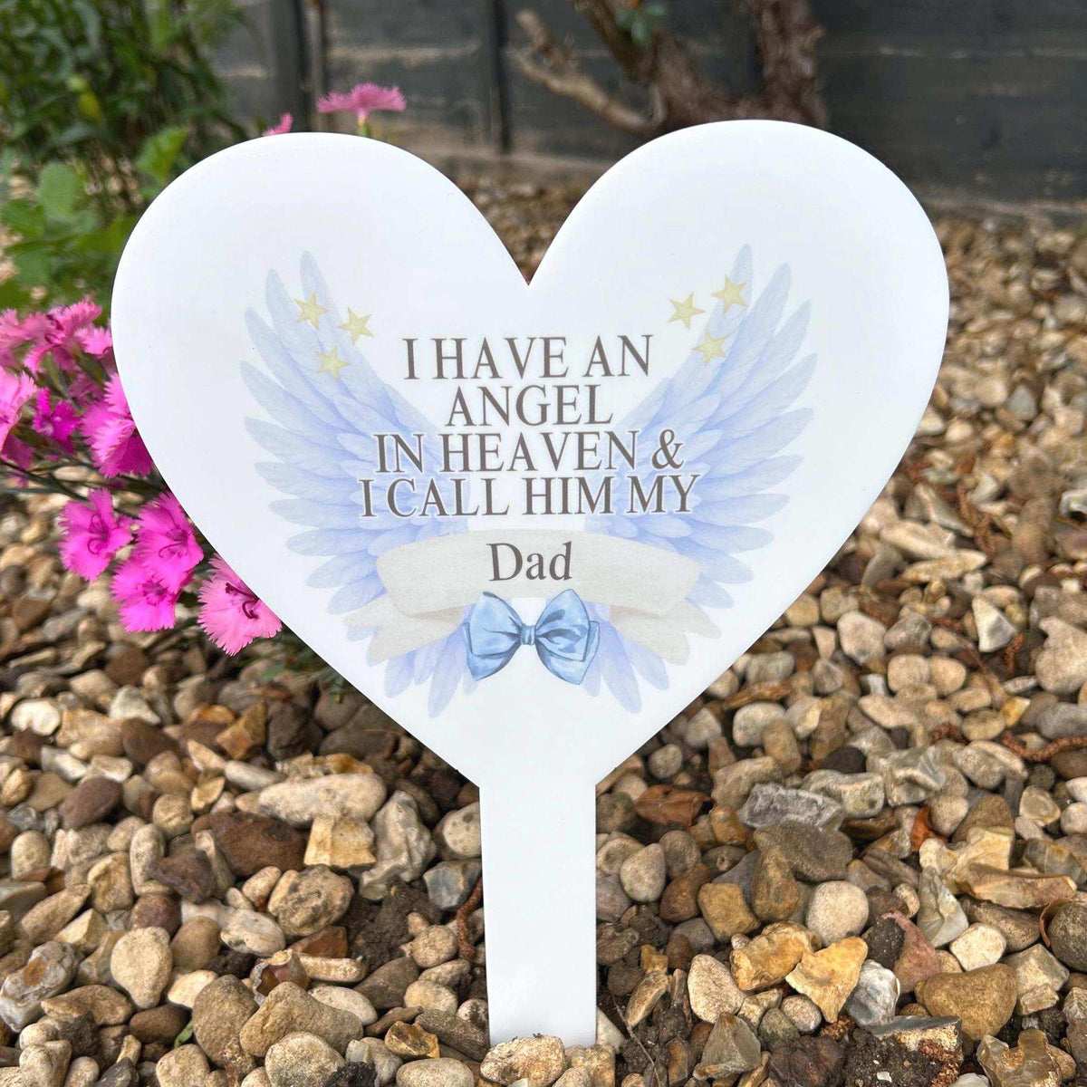 Angel wings graveside memorial marker for someone deeply missed