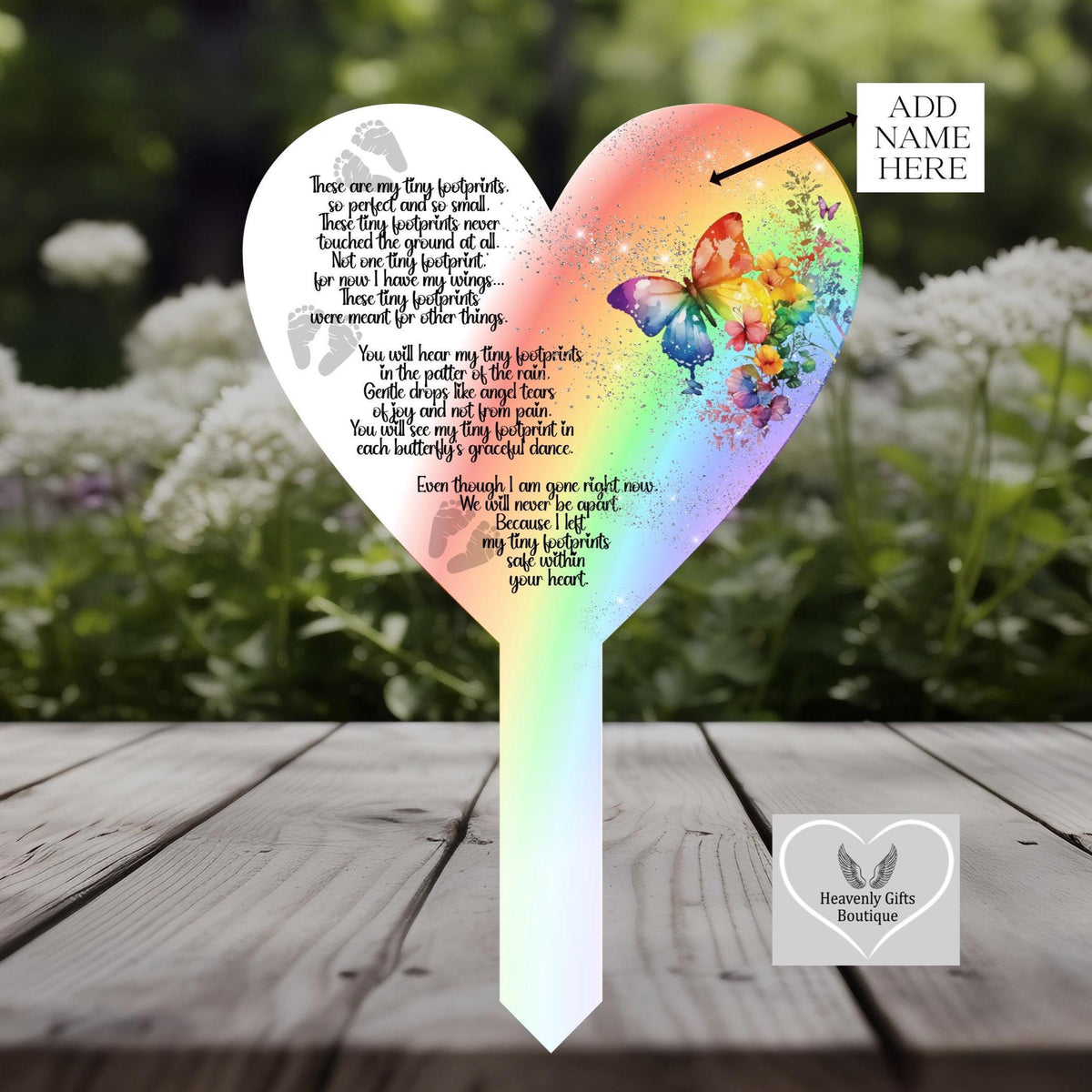 Heart shaped baby loss memorial grave marker with tiny footprints design