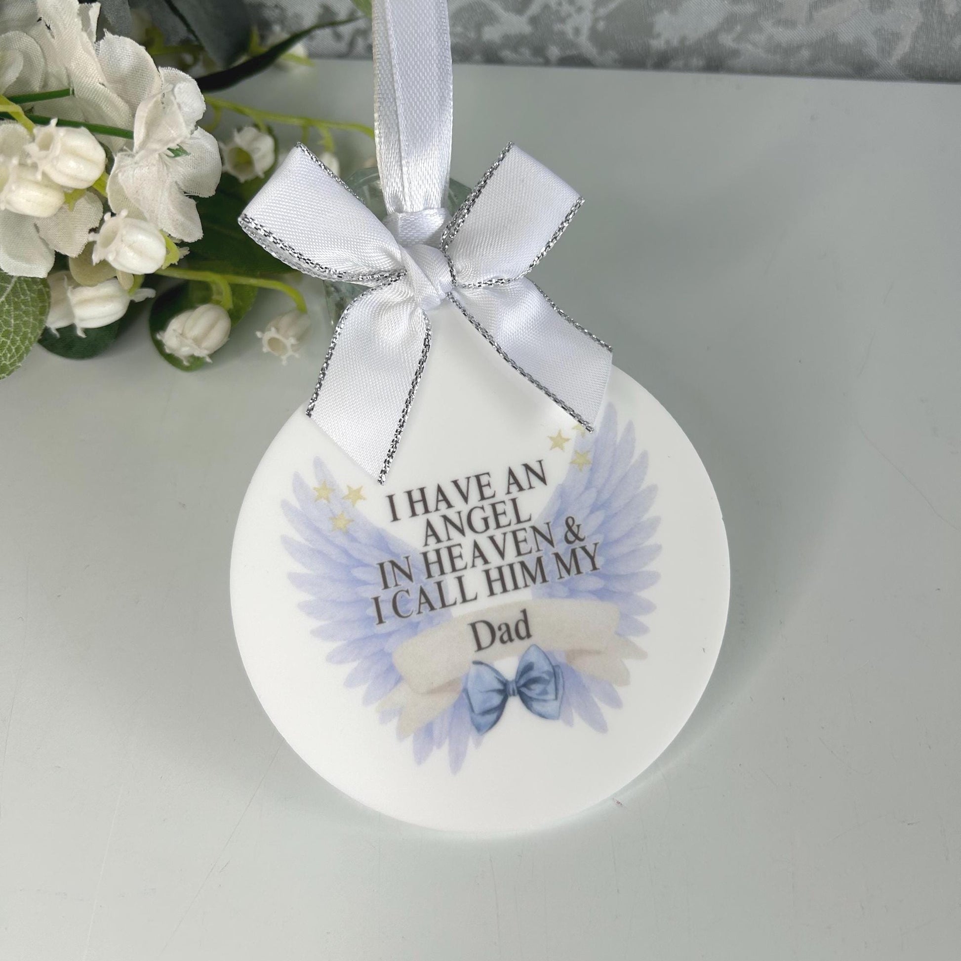 Blue angel wings memorial bauble personalised with relationship and name