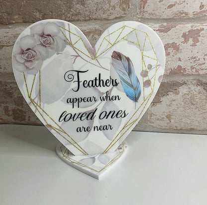 Personalised memorial heart plaque with delicate blue feathers