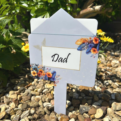 Blue letter-style memorial grave marker personalised for a loved one