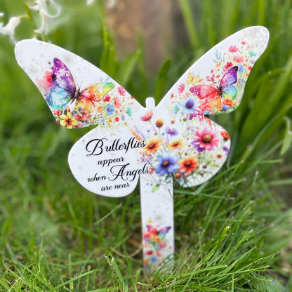 Butterflies Appear grave marker with rainbow butterfly and wildflowers