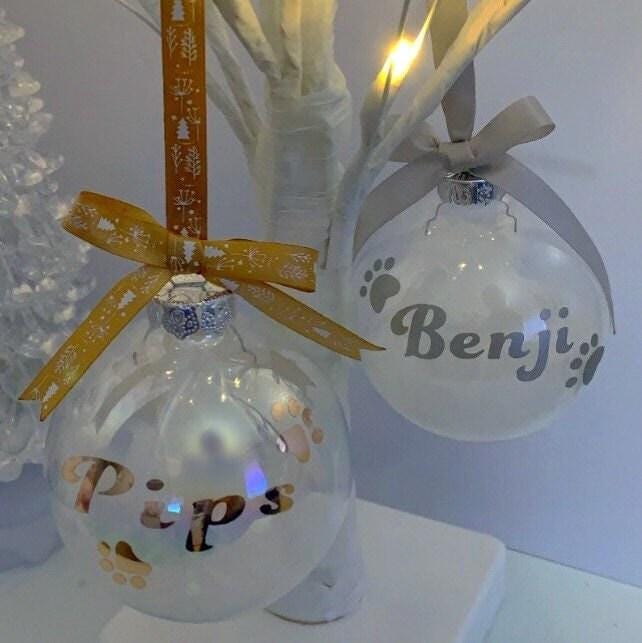 Pet remembrance glass bauble filled with soft white feathers