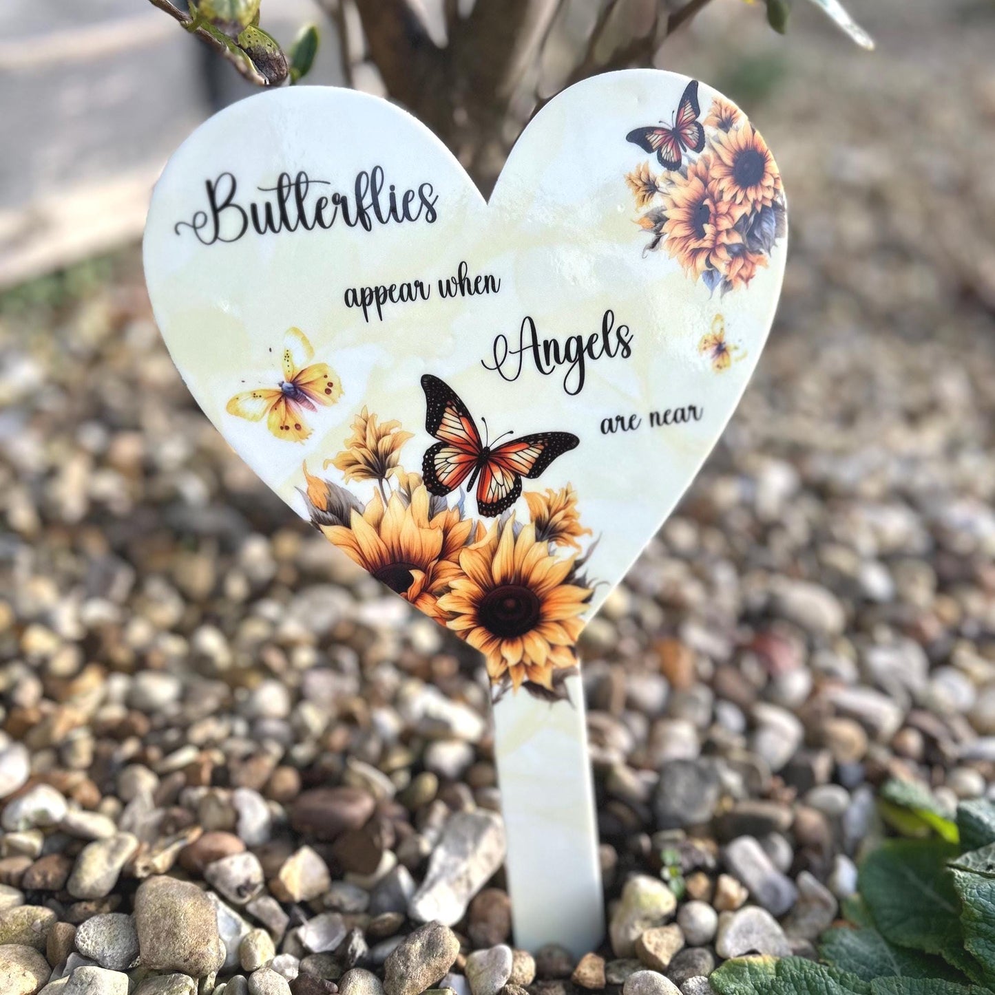 Heart-shaped decorative grave stake with butterfly and sunflower design 