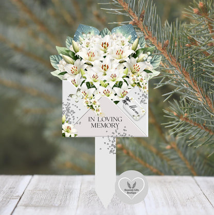 Grey and white grave marker with In Loving Memory design