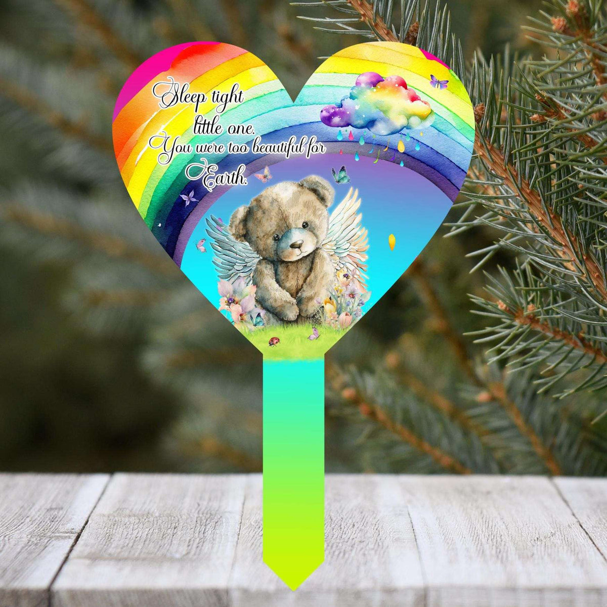 Heart shaped baby loss grave marker with teddy bear and rainbow