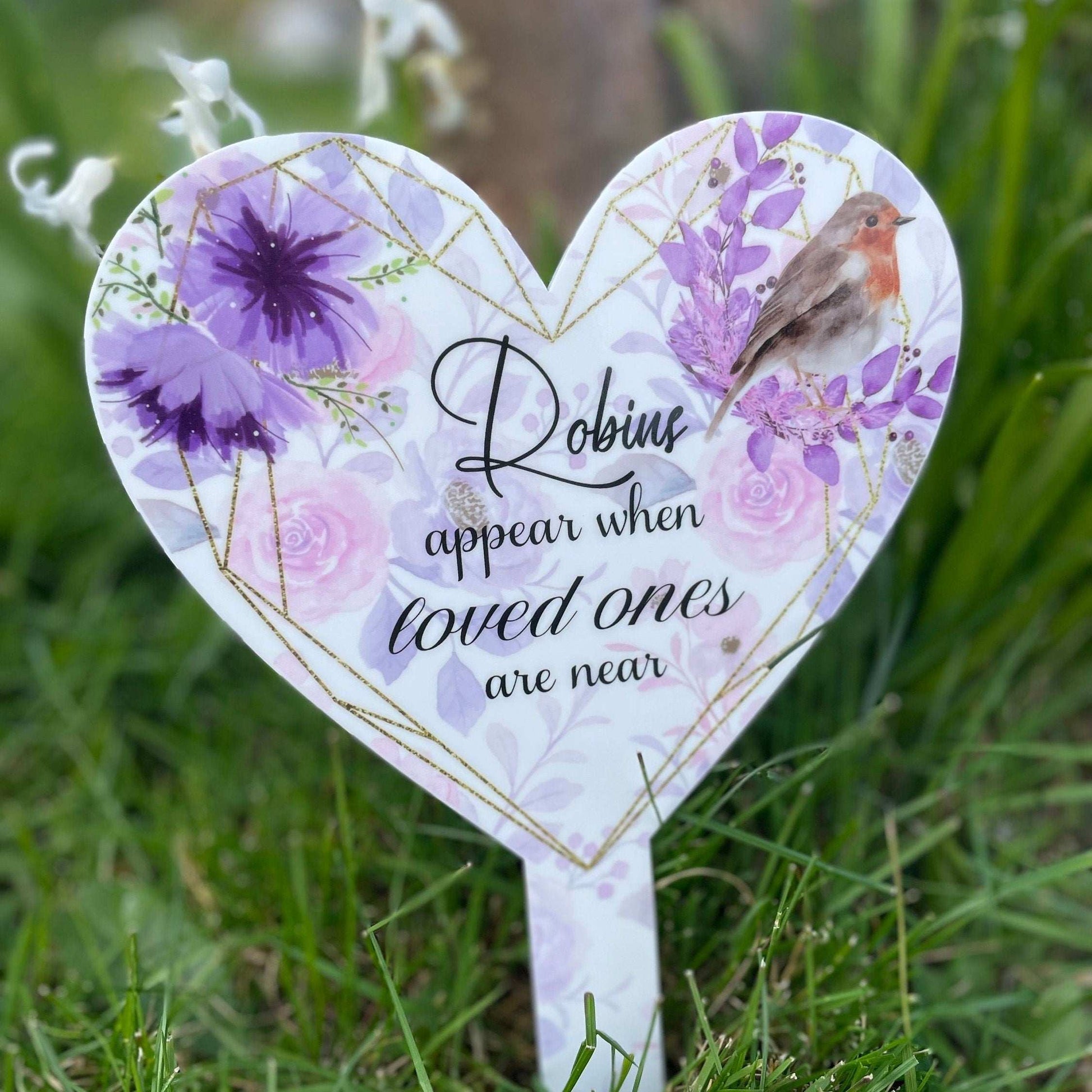 Robins Appear When Loved Ones Are Near Grave Marker