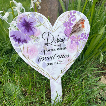 Robins Appear When Loved Ones Are Near Grave Marker
