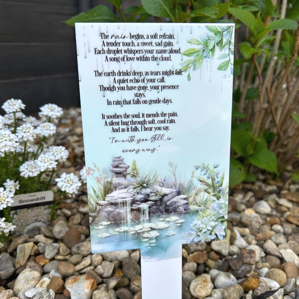 In The Rain memorial grave marker with peaceful waterfall design