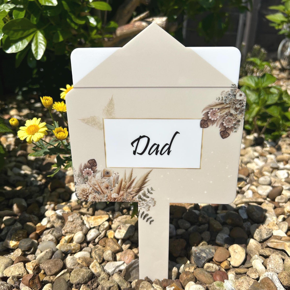 Letter-style memorial grave marker personalised in remembrance of a loved one