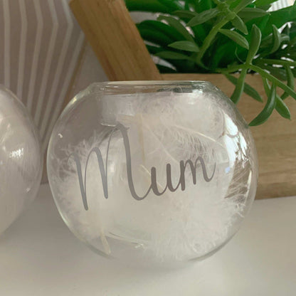 Memorial feather filled glass tealight keepsake for someone deeply missed
