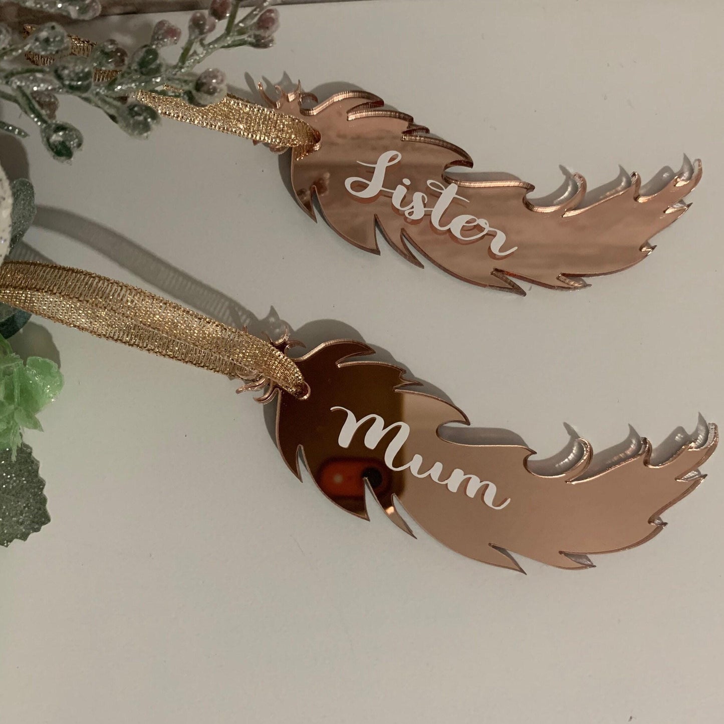 Mirror finish feather memorial keepsake in memory of a loved one