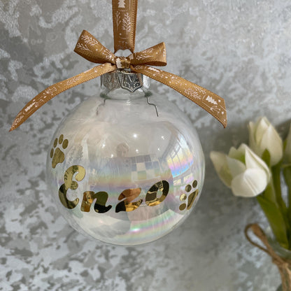 Personalised dog memorial Christmas bauble with paw prints