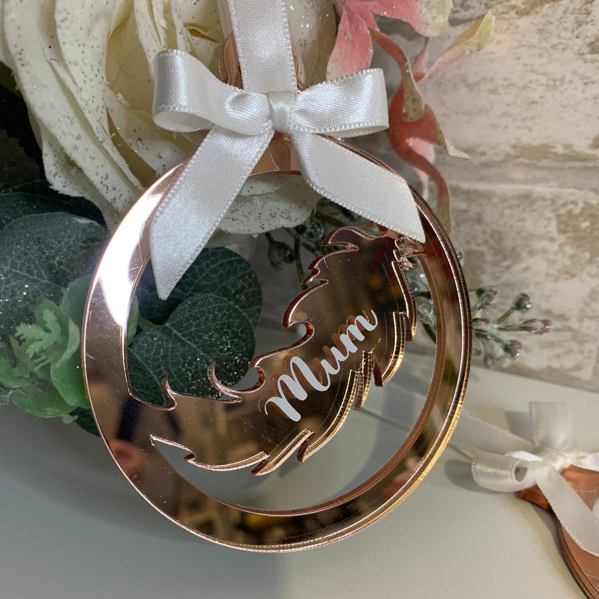 Personalised feather remembrance decoration for a loved one