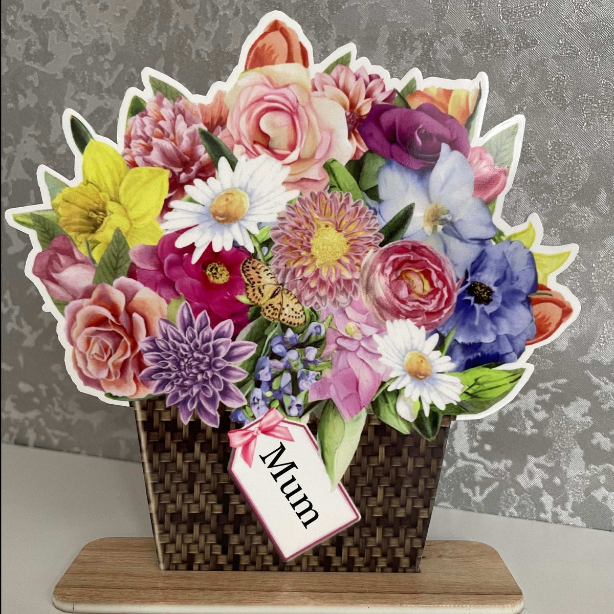 Personalised flower bouquet plaque displayed on its freestanding base