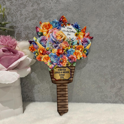 Flower bouquet memorial grave marker personalised as a remembrance tribute