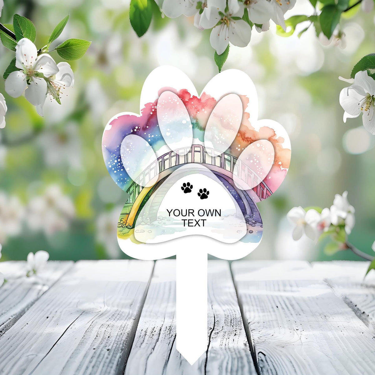 Pet bereavement memorial grave marker with rainbow and paw design