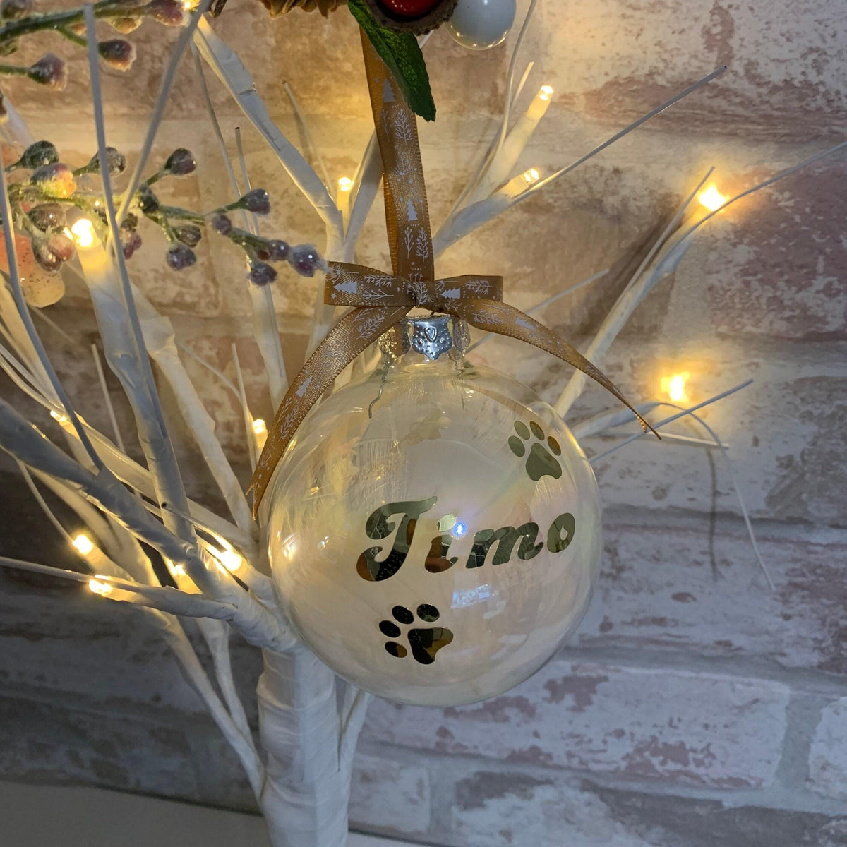 Pet remembrance bauble filled with soft white feathers