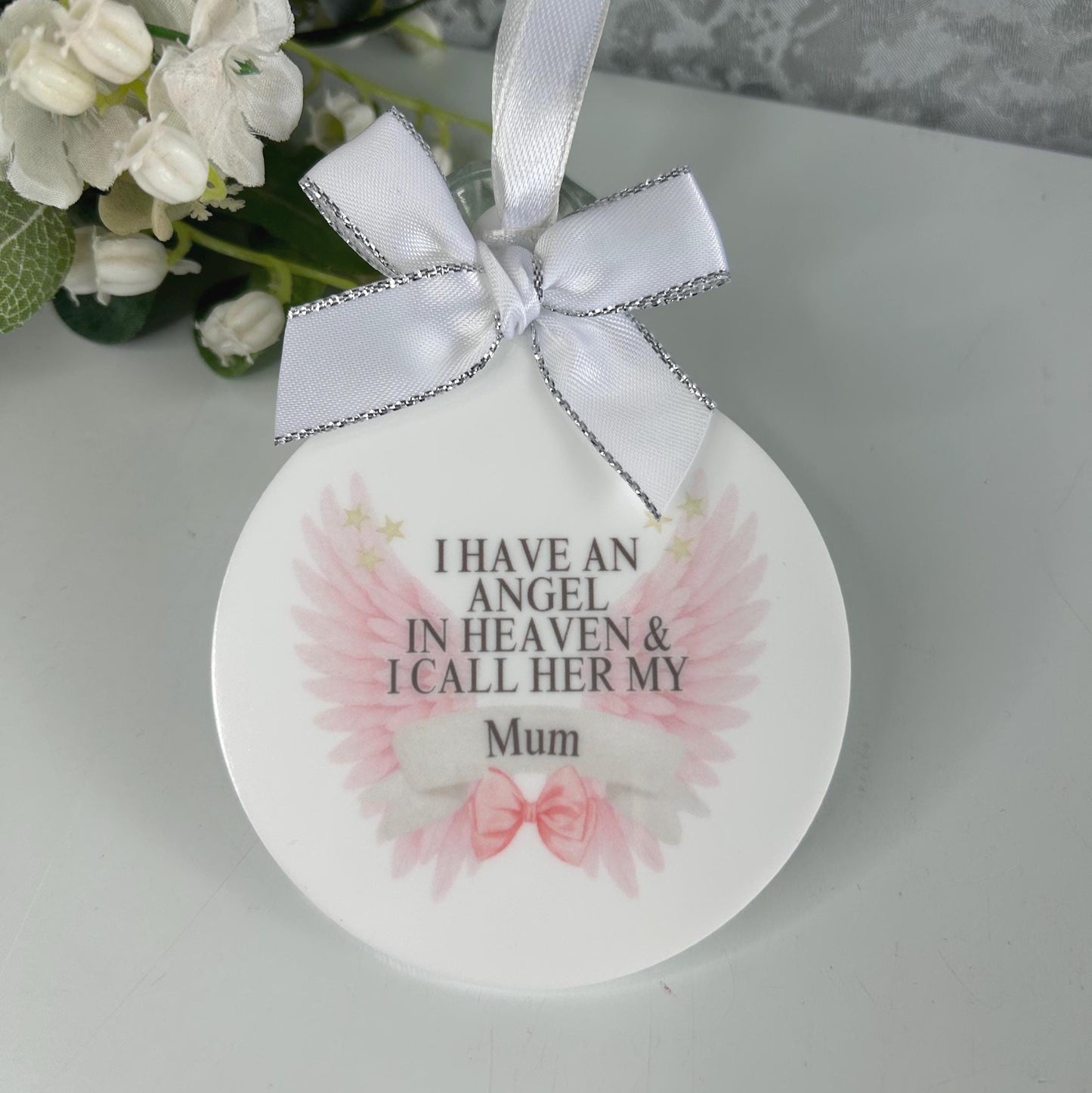 Pink angel wings memorial bauble personalised for a loved one