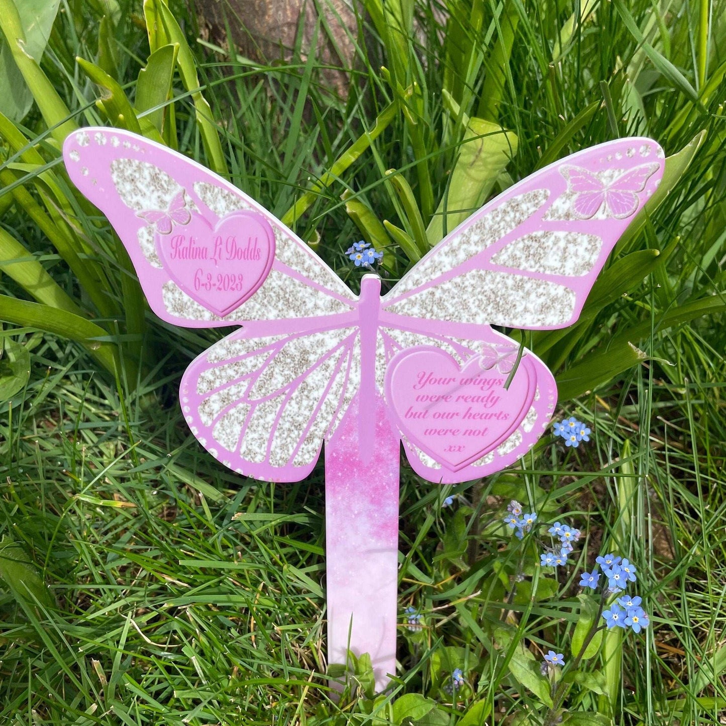 Pink butterfly memorial grave marker with personalised name and quote