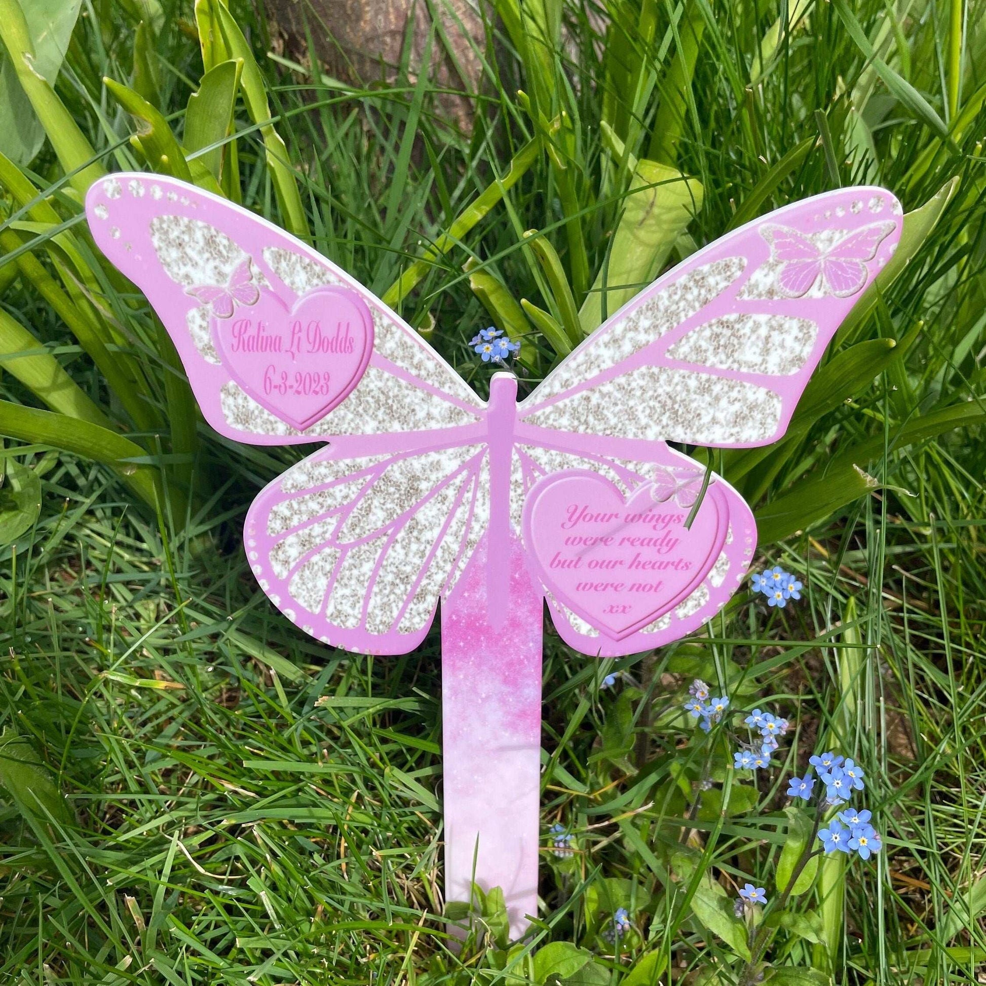 Pink butterfly memorial grave marker with personalised name and quote