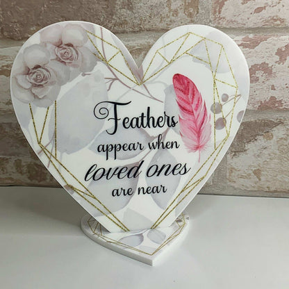 Personalised memorial heart plaque with delicate pink feathers