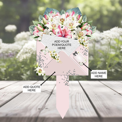 Pink lily flower bouquet memorial tribute for a graveside