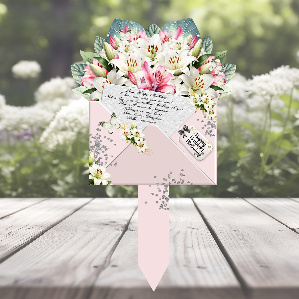 Pink lily personalised memorial bouquet marker for a graveside