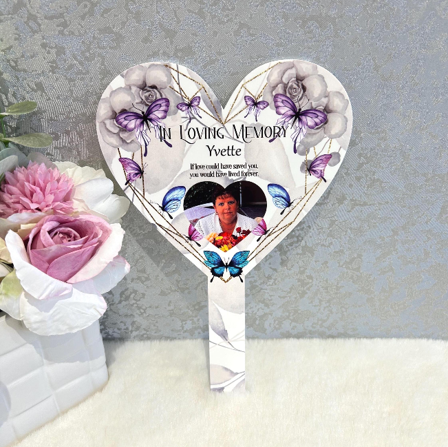 Purple butterfly heart memorial marker for a loved one