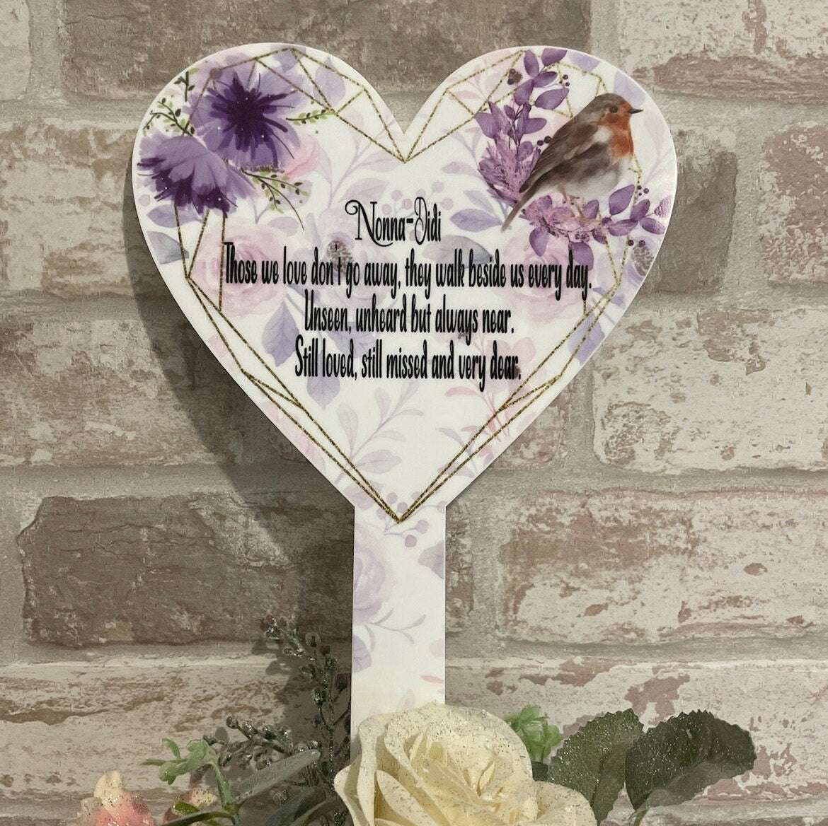 Purple robin heart memorial marker for a loved one