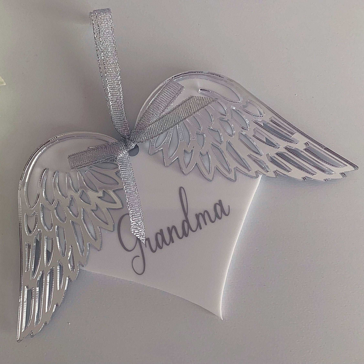 Rose gold mirrored angel wings hanging decoration with memorial wording