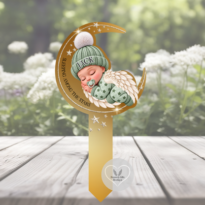 Baby loss memorial grave marker with sleeping angel baby, crescent moon and delicate stars.