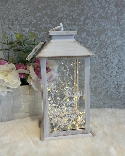 Illuminated white large memorial lantern with warm LED lights and feather design